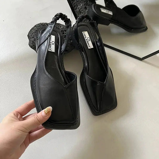 View of elegant summer slingback shoes in soft beige fabric, featuring a comfortable strap and a stylish silhouette