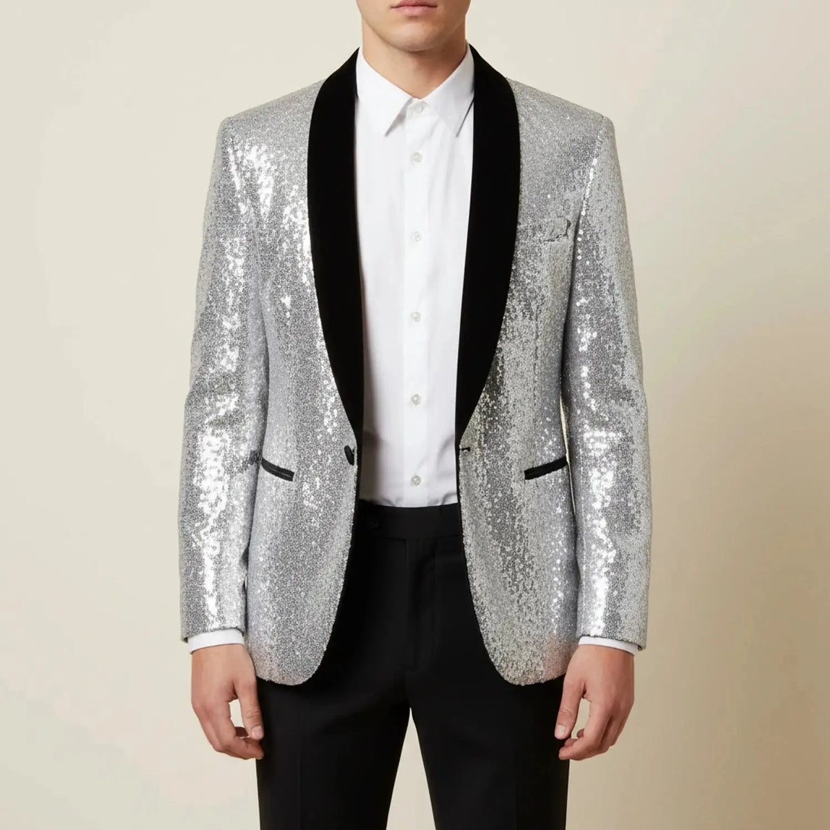 View of a slim evening blazer in deep navy blue, featuring a subtle shimmer and sleek lapels