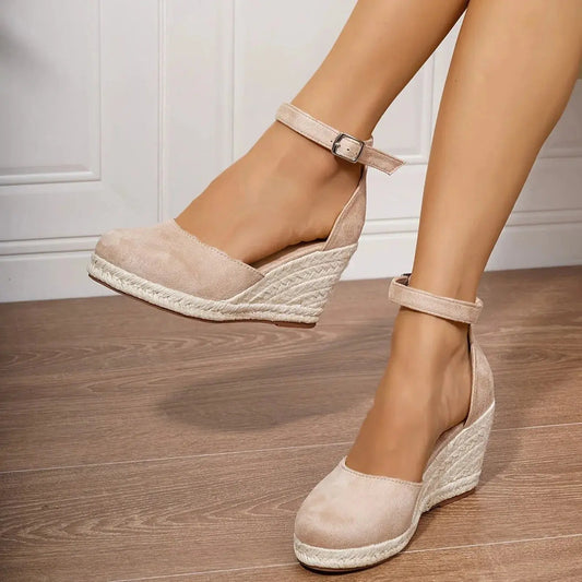 View of chic supportive platform shoes in soft beige, featuring a textured upper and sturdy sole for comfort