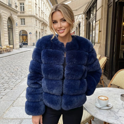 View of a luxurious fluffy autumn coat in soft beige, featuring a high collar and textured fabric