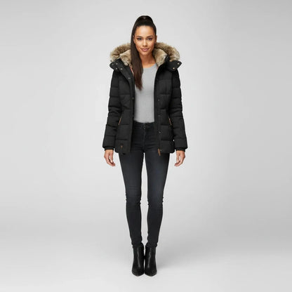 View of a fitted winter puffer jacket in deep green, featuring a high collar and sleek silhouette