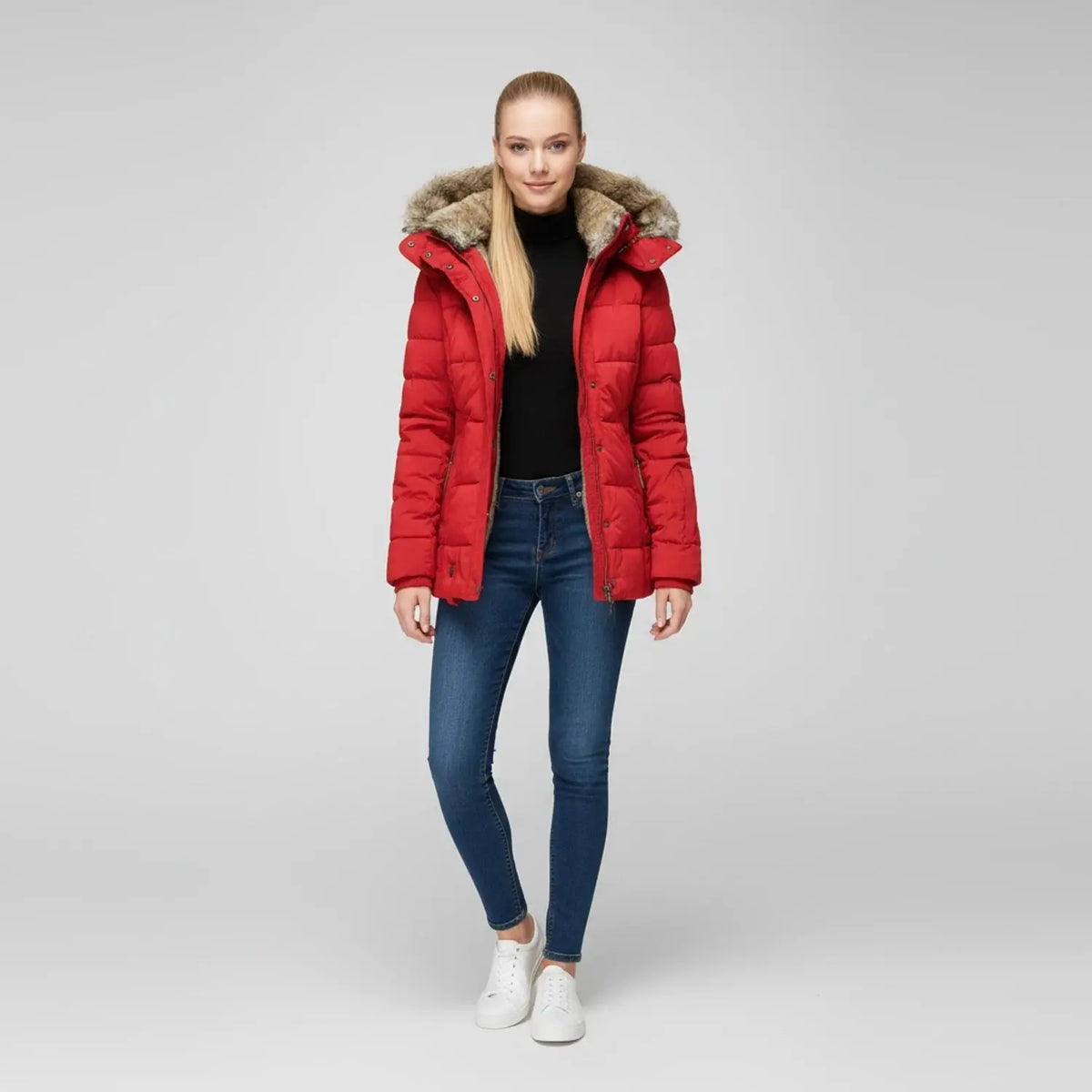 View of a fitted winter puffer jacket in deep green, featuring a high collar and quilted texture