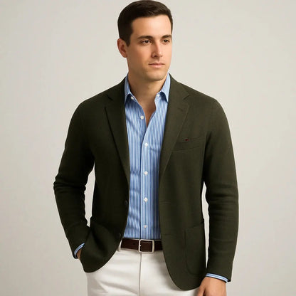 View of a polished relaxed blazer in deep navy, featuring a smooth fabric texture and structured lapels