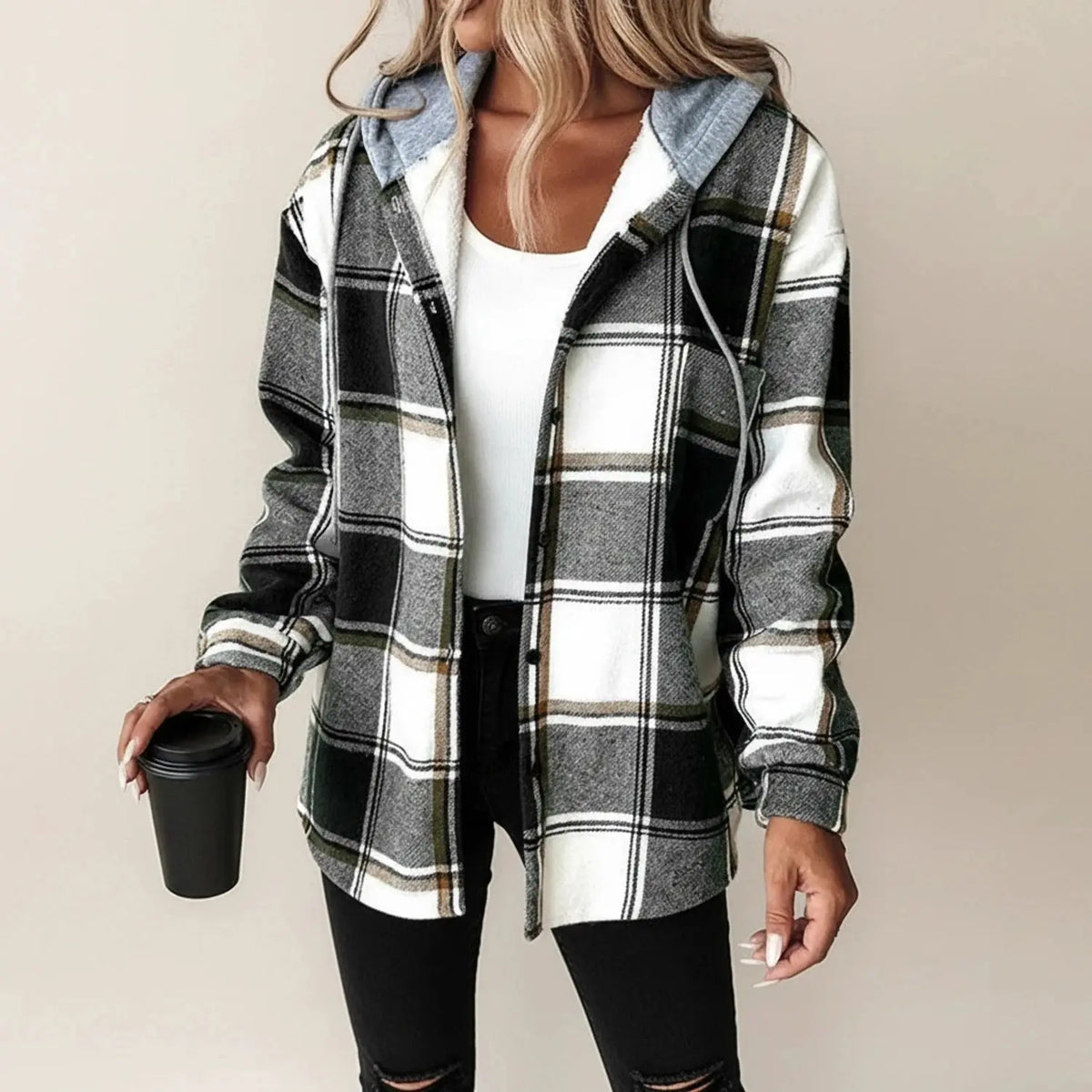 View of a relaxed plaid winter jacket in shades of red and black, featuring a soft fabric and comfortable fit