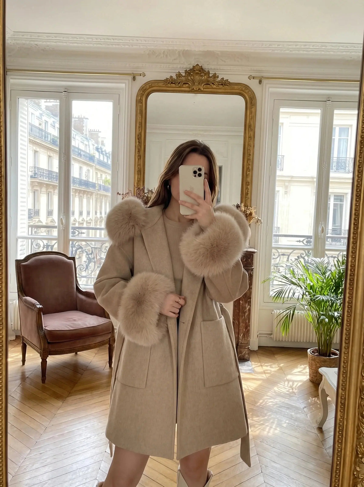 View of a luxurious oversized winter coat in deep burgundy, featuring a soft texture, large collar, and button closure