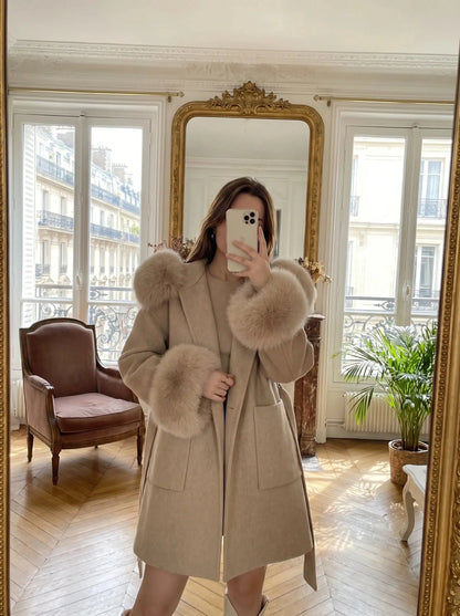 View of a luxurious oversized winter coat in deep burgundy, featuring a soft texture, large collar, and button closure