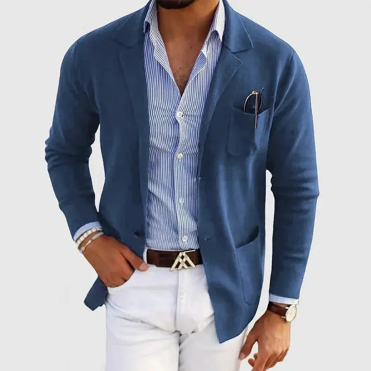 View of a polished relaxed blazer in dark navy, featuring a single button closure and notched lapels