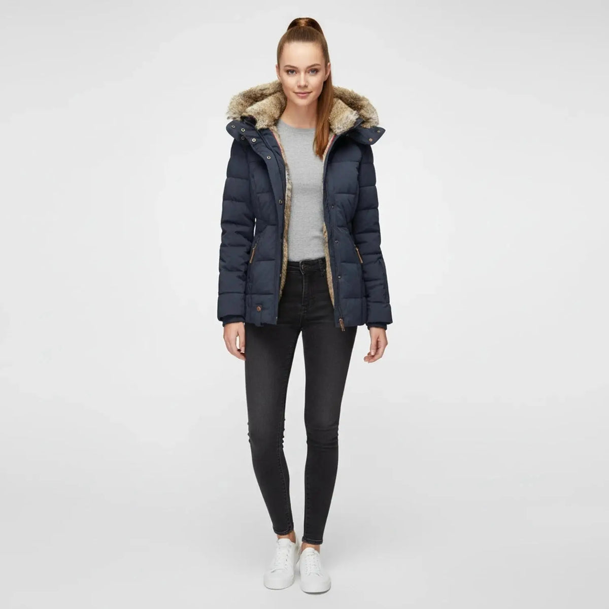 View of a fitted winter puffer jacket in deep burgundy, featuring a high collar and quilted texture