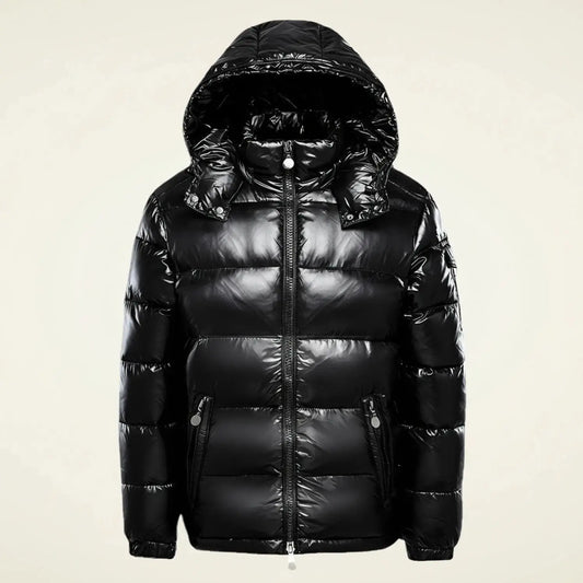 View of a stylish quilted winter puffer jacket in dark gray, featuring a high collar and zippered pockets