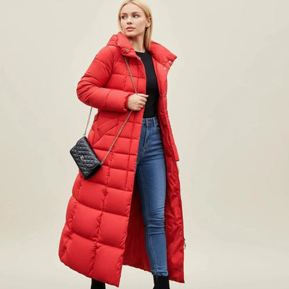 View of a chic quilted winter jacket in deep burgundy, featuring a stand collar and stylish stitching patterns