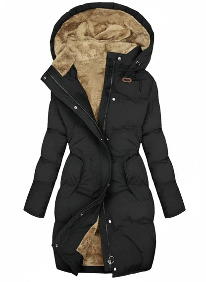 View of a stylish insulated winter puffer jacket in deep green, featuring a cinched waist and a hood