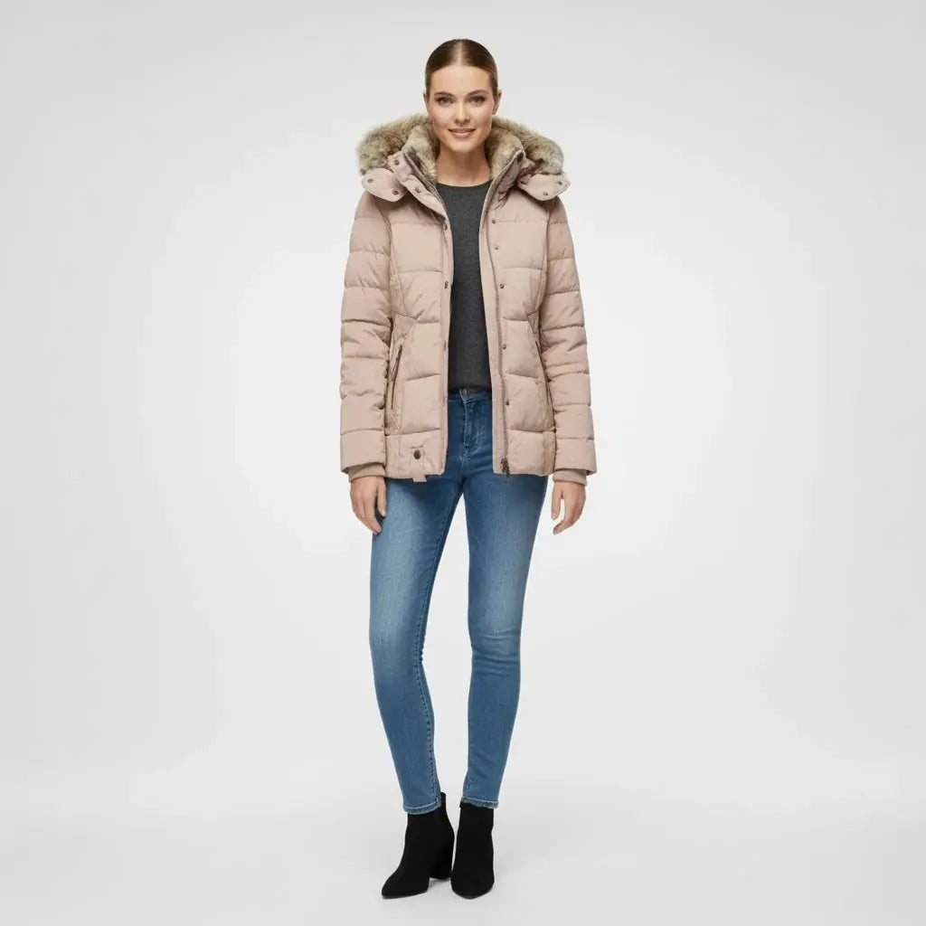 View of a fitted winter puffer jacket in deep burgundy, showcasing quilted texture and a high collar