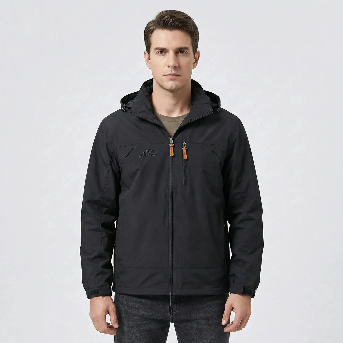 View of a water repellent outdoor jacket in dark green, featuring a high collar and zippered pockets