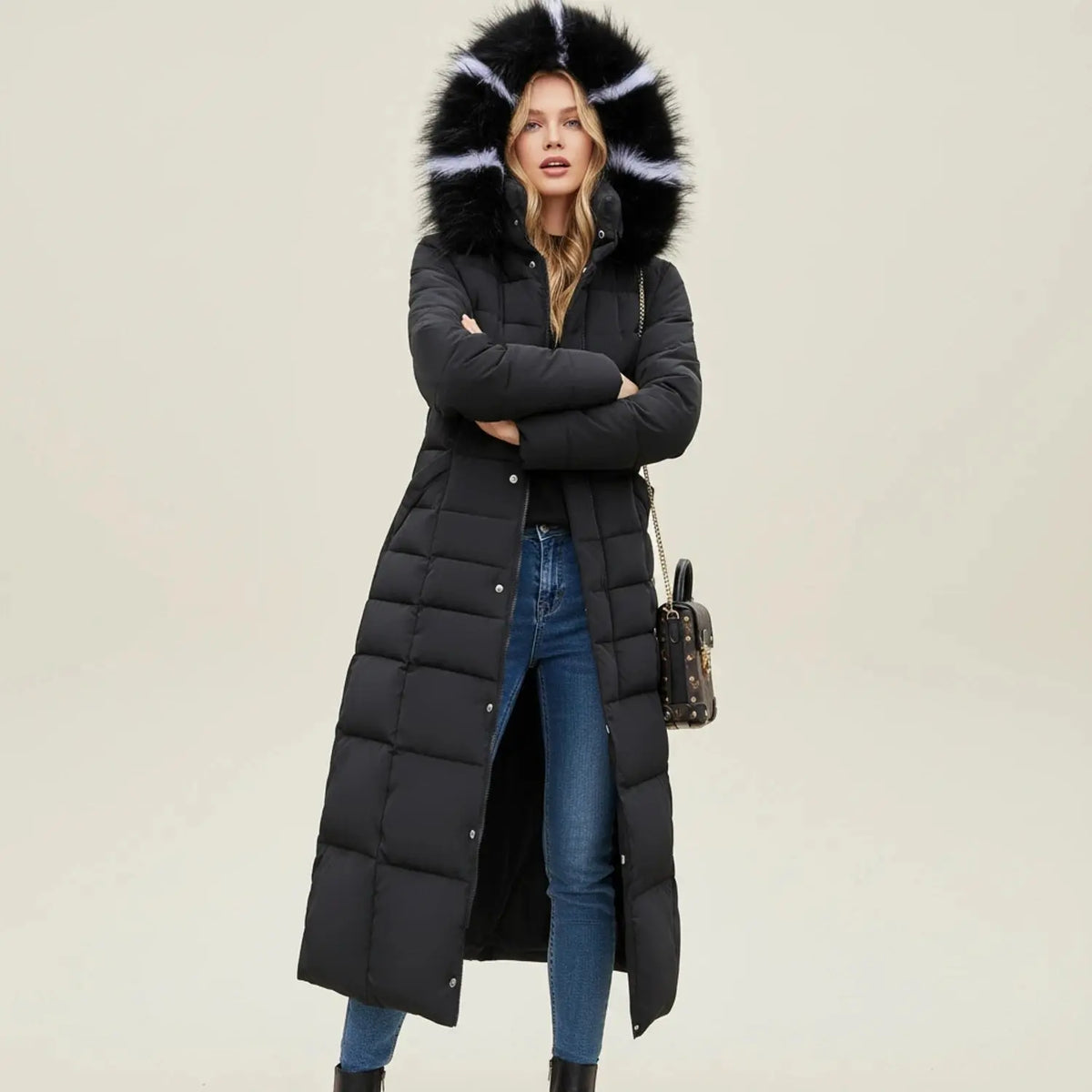 View of a chic quilted winter jacket in deep burgundy, featuring a fitted silhouette and cozy high collar