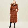 View of a chic quilted winter jacket in deep burgundy, featuring a high collar and zippered pockets