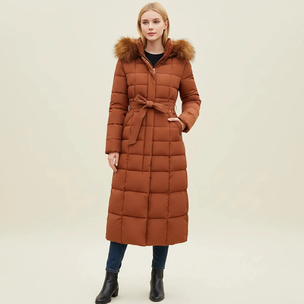 View of a chic quilted winter jacket in deep burgundy, featuring a high collar and zippered pockets