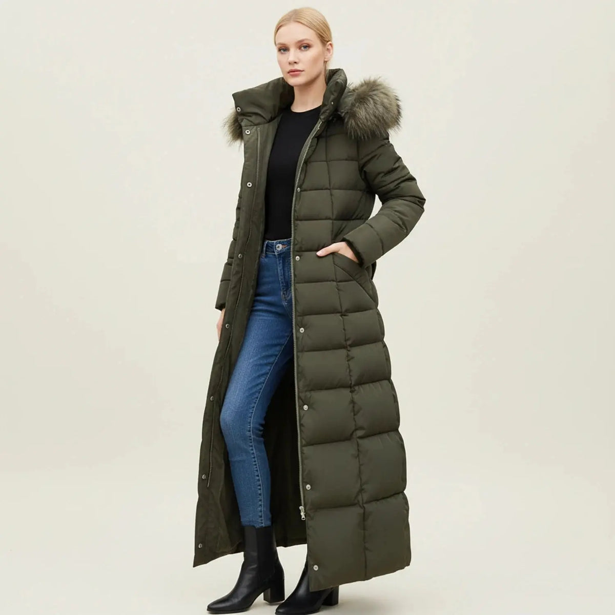 View of a women's chic quilted winter jacket in deep burgundy, featuring a high collar and subtle stitching patterns