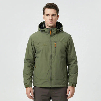 View of a men's water repellent outdoor jacket in dark green, featuring a zippered and adjustable cuffs